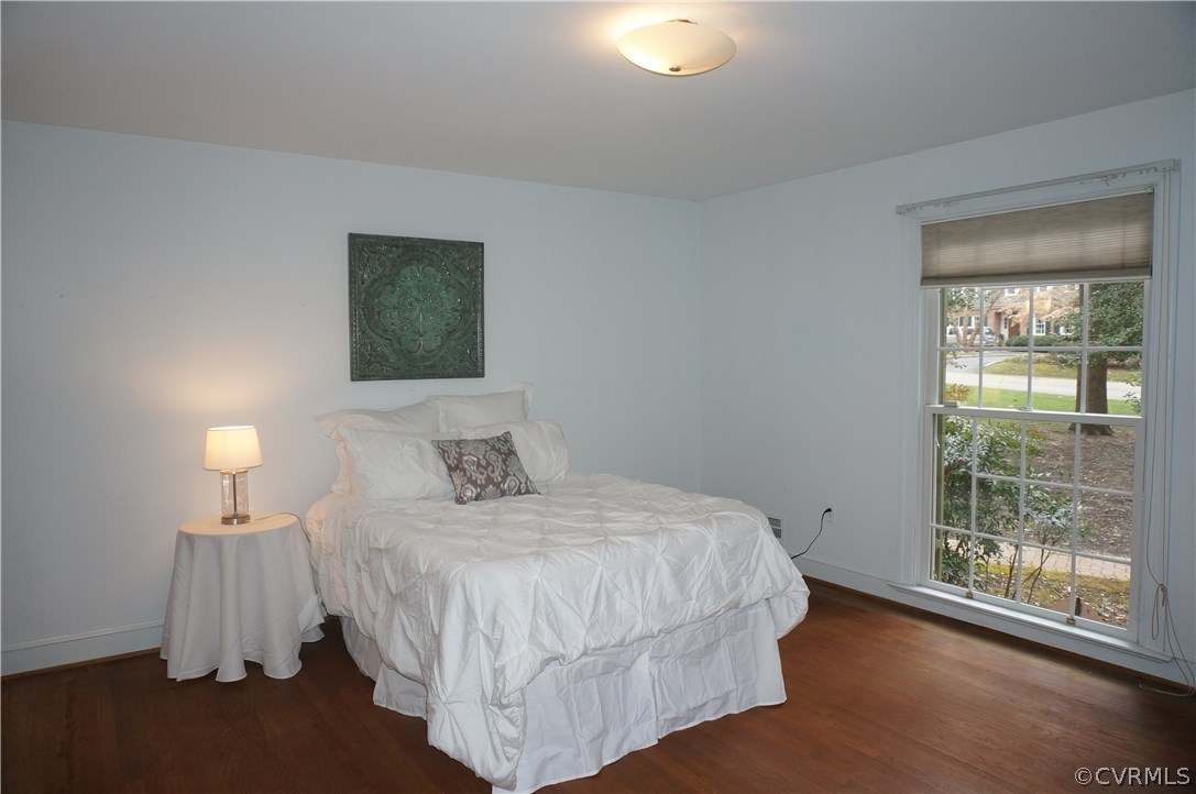 3701 East Old Gun Road Midlothian, VA 23113 - Photo 10 of 19 a bedroom with a bed and a lamp
