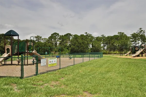 a view of swimming pool from a balcony