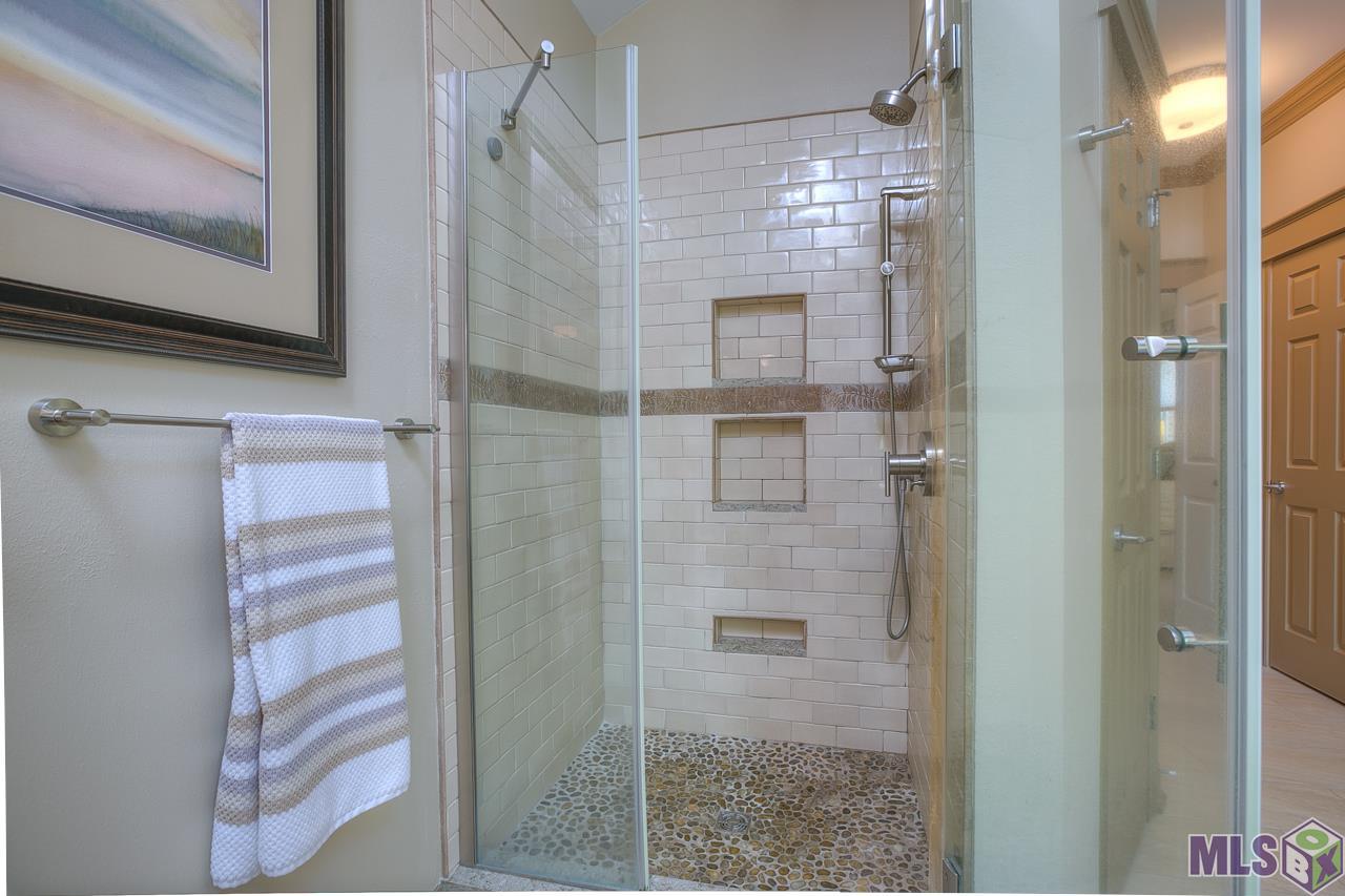 418 Plantation Ridge Drive Baton Rouge, LA 70810 - Photo 19 of 32 MASTER SEAMLESS GLASS & TILED SHOWER