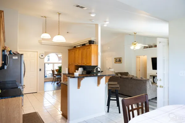 a view of a kitchen and dining room furniture