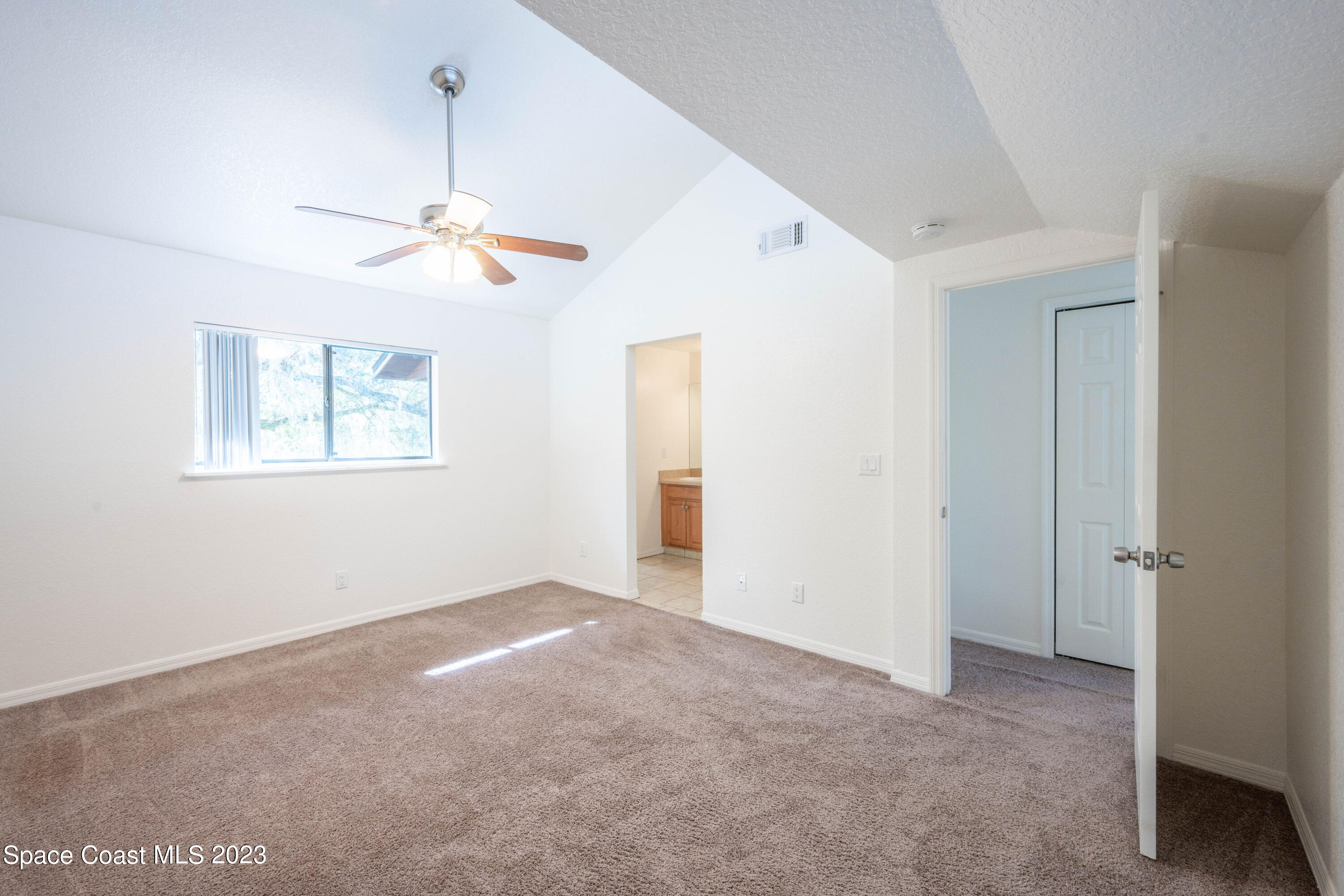 1130 Gary Hunt Road, Unit B Cocoa, FL 32926 - Photo 20 of 33 a view of an empty room with a window