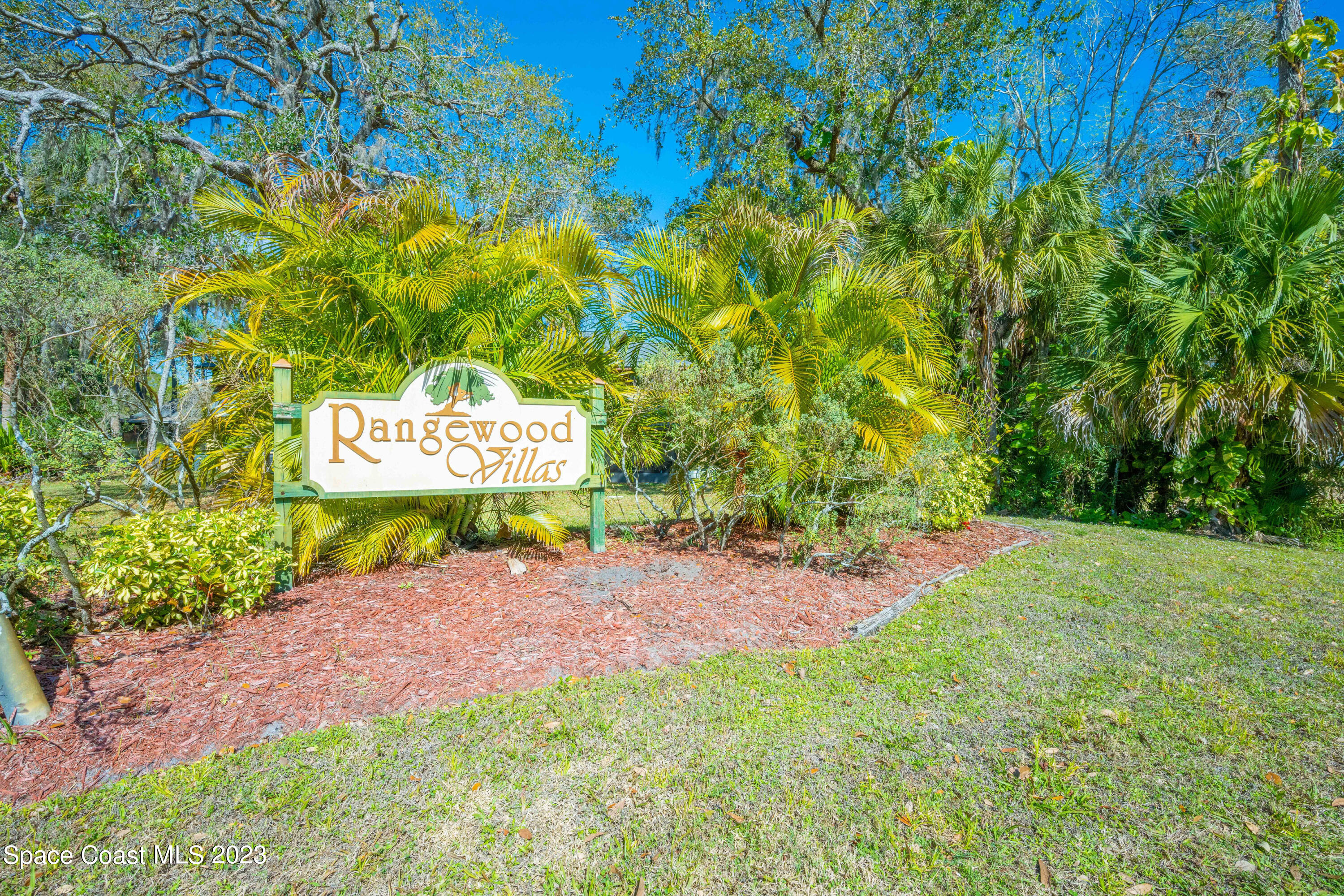 1130 Gary Hunt Road, Unit B Cocoa, FL 32926 - Photo 33 of 33 a sign that is sitting in the grass