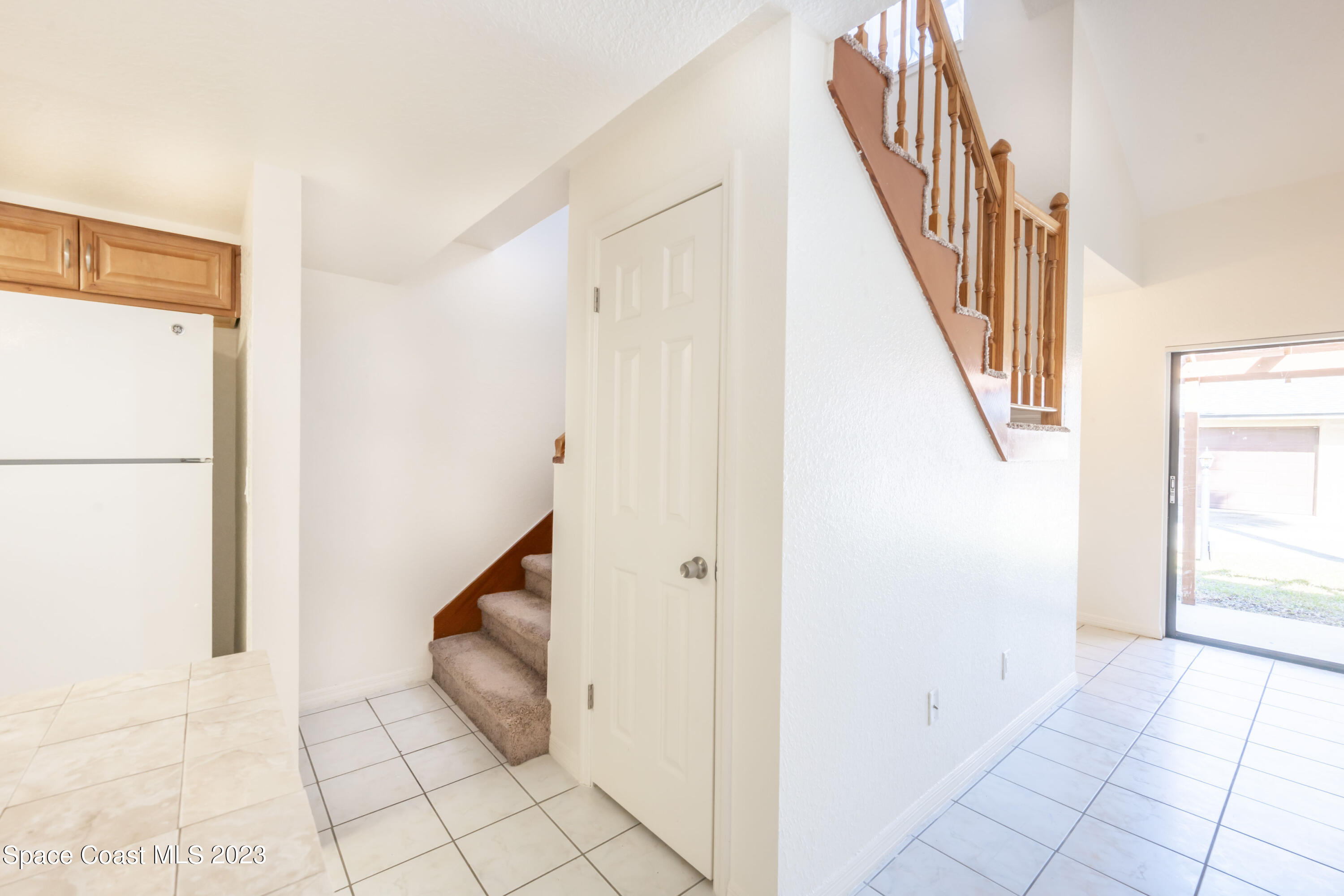1130 Gary Hunt Road, Unit B Cocoa, FL 32926 - Photo 10 of 33 a view of a hallway with staircase