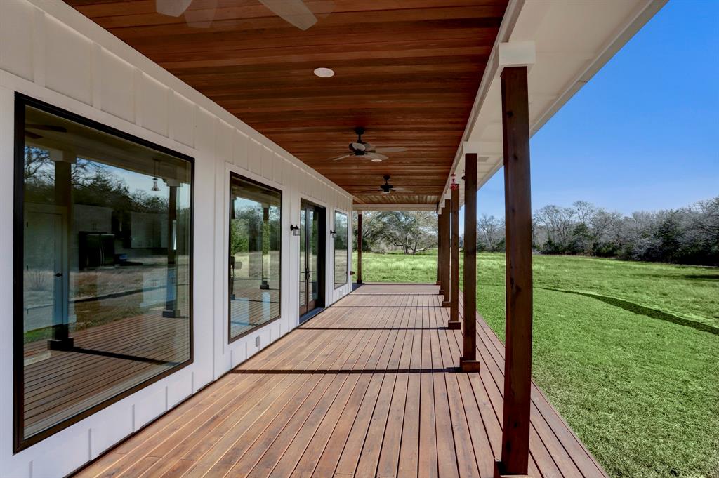 a view of porch with wooden floor and outdoor space