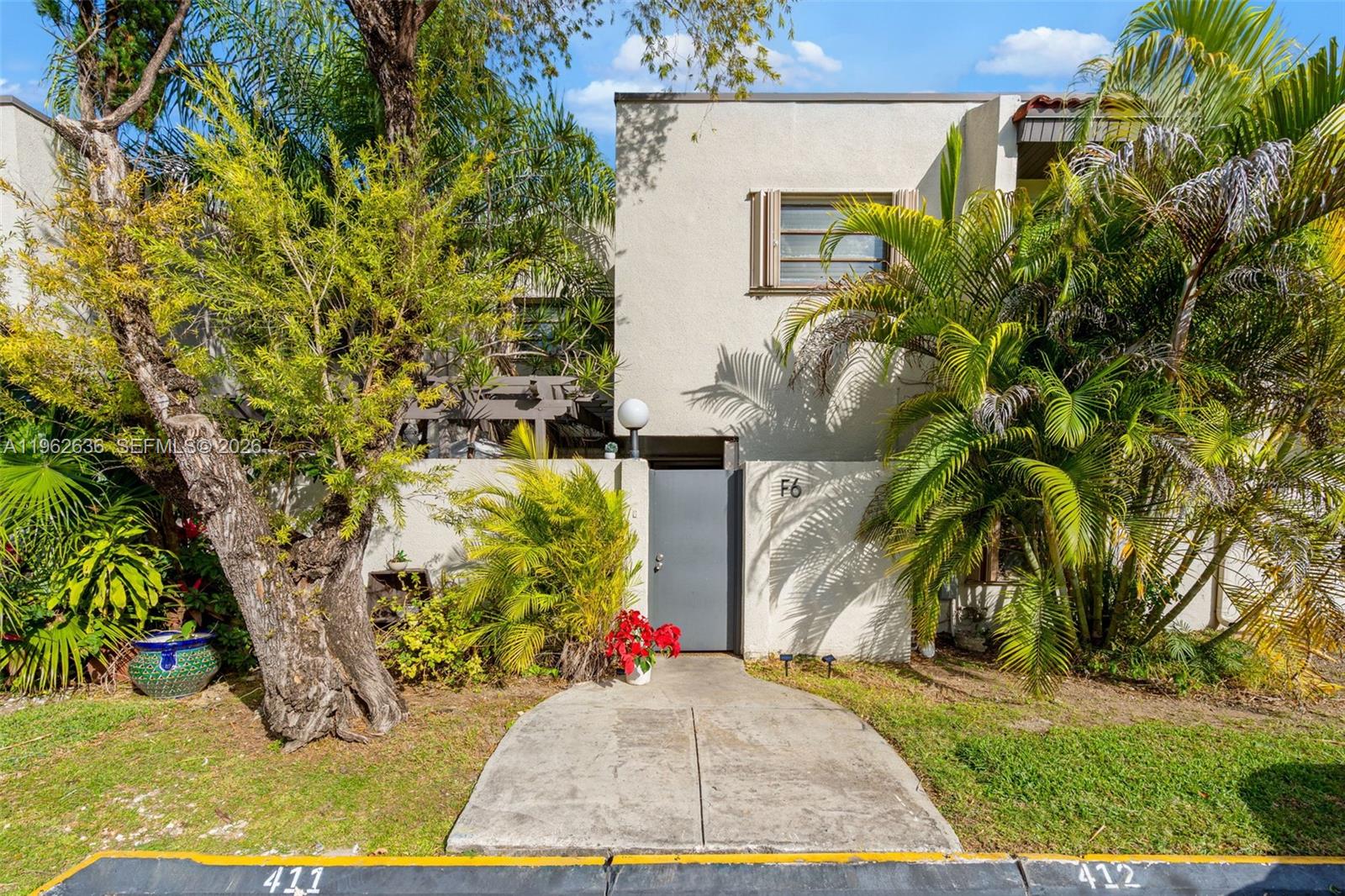 4726 Southwest 67th Avenue, Unit F6 Miami, FL 33155 - Photo 1 of 37 a view of outdoor space