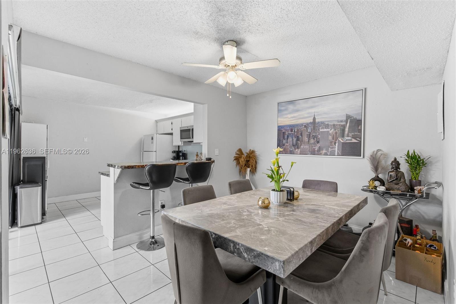 4726 Southwest 67th Avenue, Unit F6 Miami, FL 33155 - Photo 11 of 37 a view of a dining room with furniture