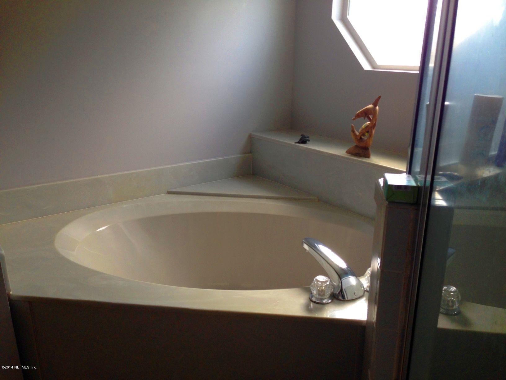 438 Federal Hill Road Orange Park, FL 32073 - Photo 8 of 14 a bathroom with a sink