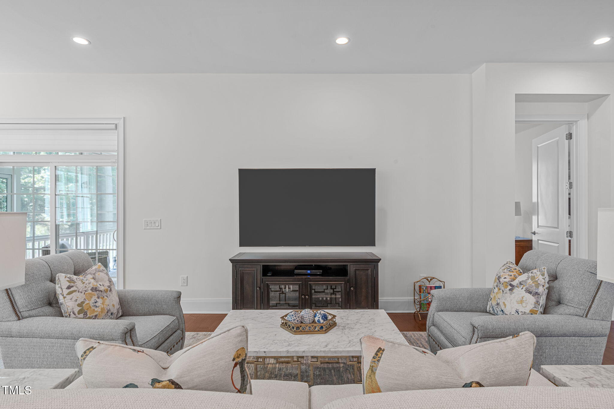 2511 Range Overlook Crossing Apex, NC 27523 - Photo 10 of 50 a living room with furniture and a fireplace