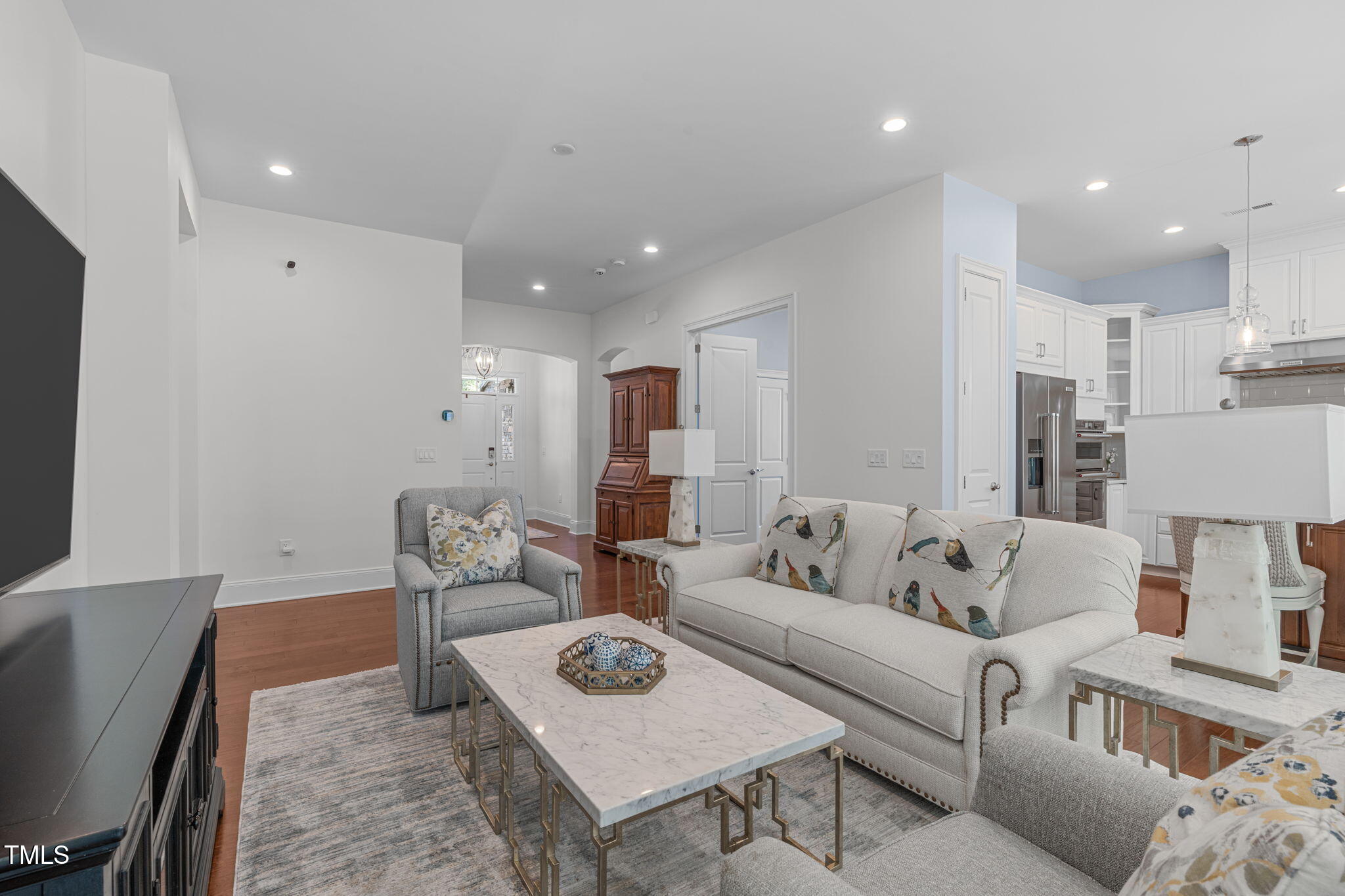 2511 Range Overlook Crossing Apex, NC 27523 - Photo 12 of 50 a living room with furniture and a couch