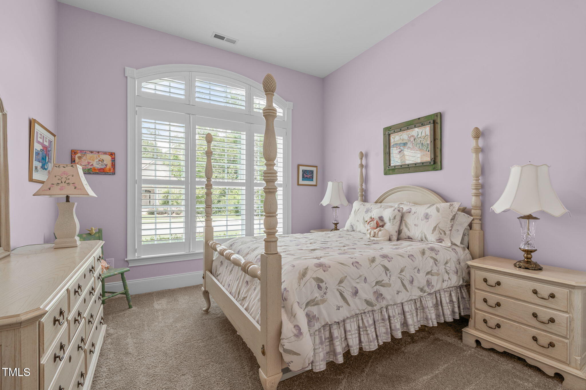 2511 Range Overlook Crossing Apex, NC 27523 - Photo 32 of 50 a bedroom with a bed and a window
