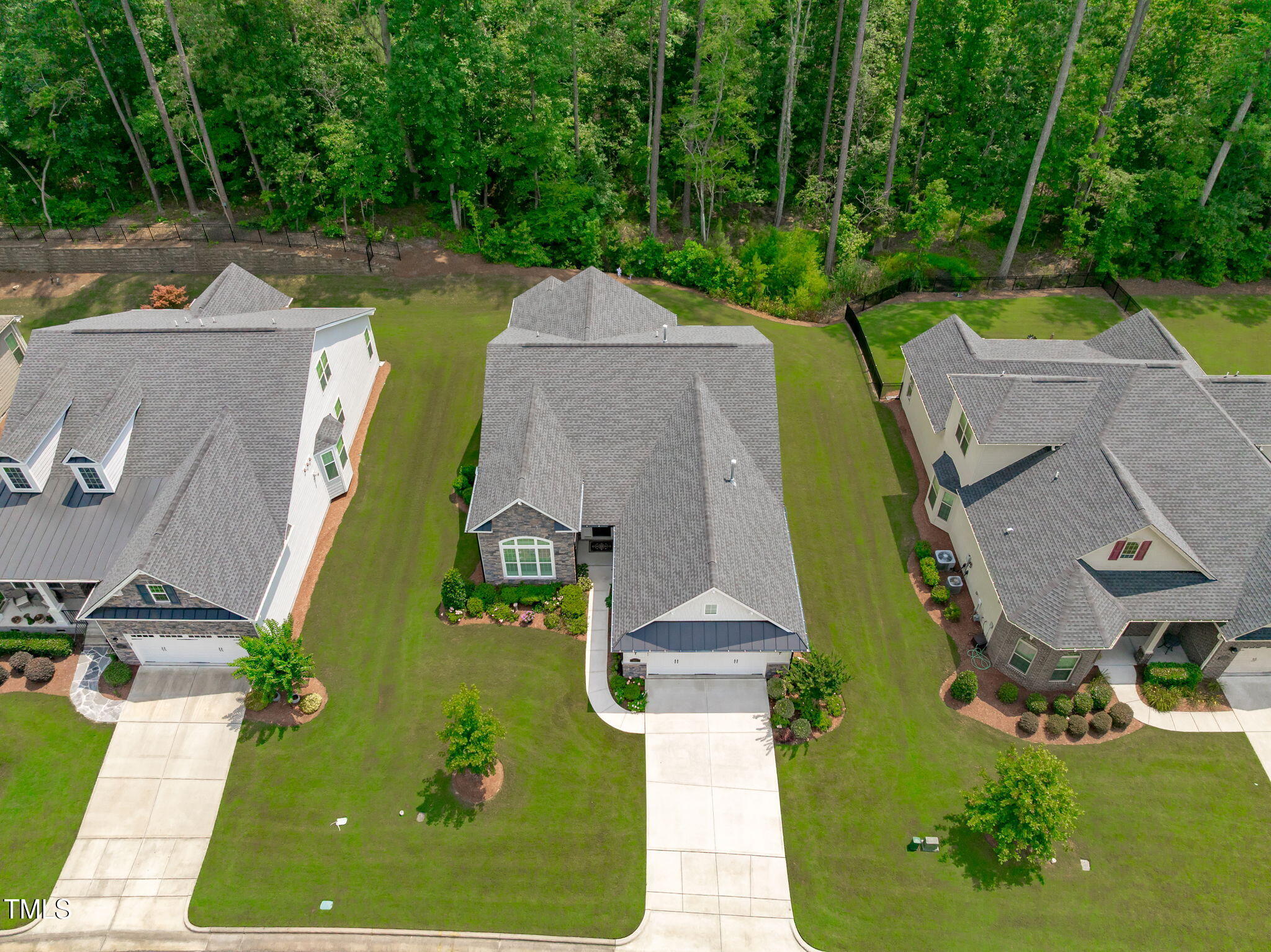 2511 Range Overlook Crossing Apex, NC 27523 - Photo 42 of 50 an aerial view of a house with a swimming pool
