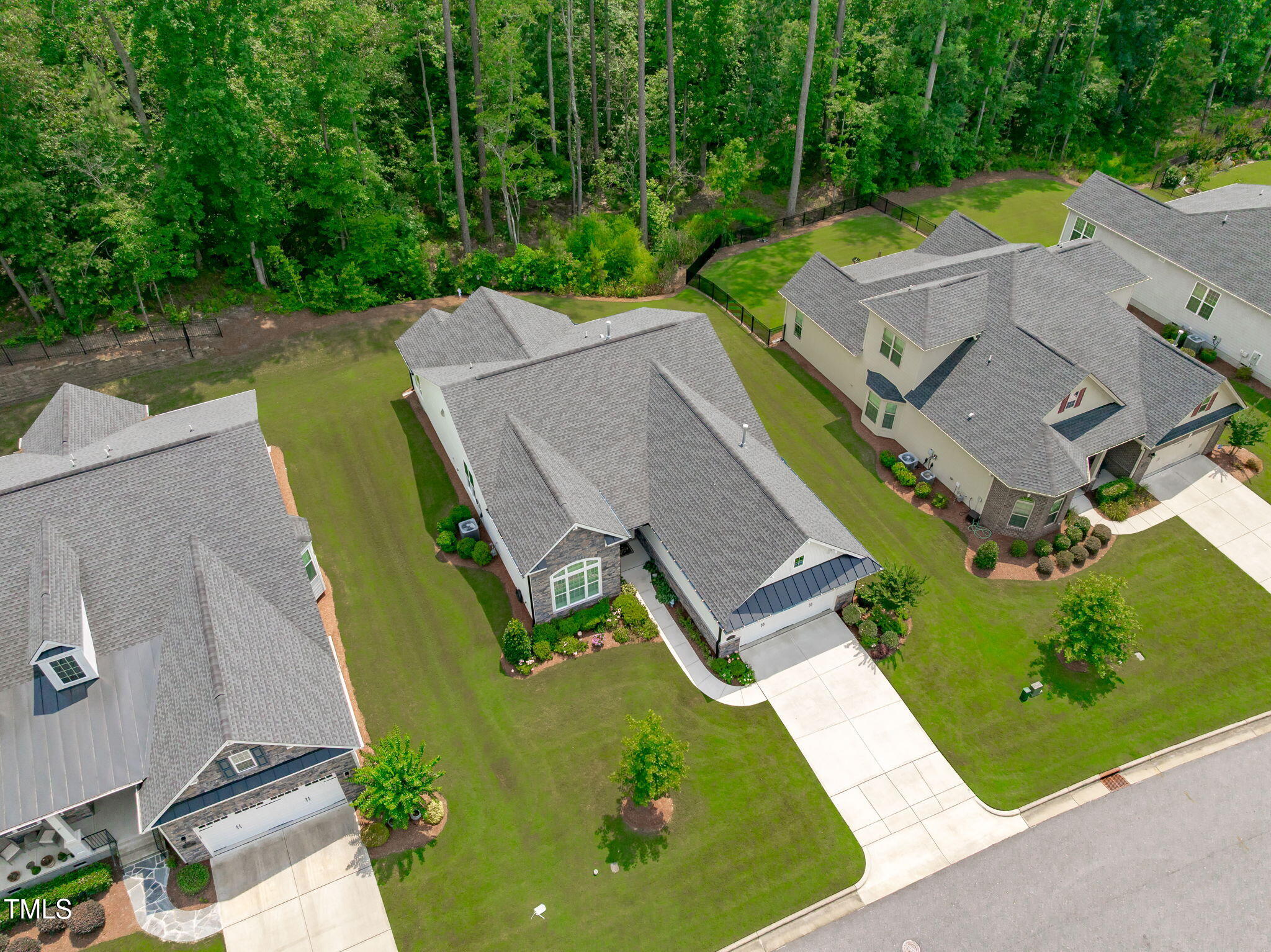 2511 Range Overlook Crossing Apex, NC 27523 - Photo 43 of 50 an aerial view of a house with a swimming pool