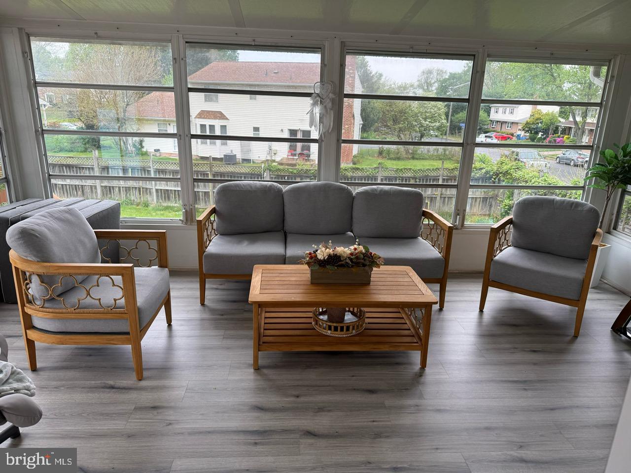 4082 Braxton Road Chantilly, VA 20151 - Photo 12 of 40 a living room with furniture and a floor to ceiling window