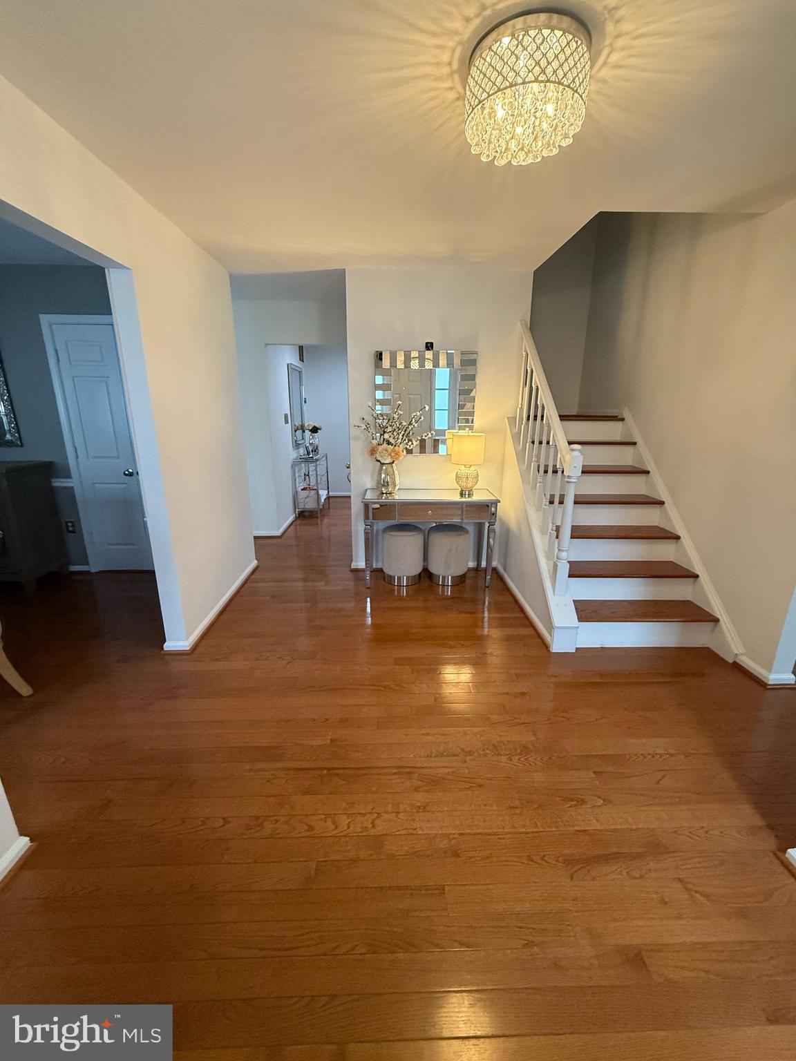 4082 Braxton Road Chantilly, VA 20151 - Photo 15 of 40 a view of a room with furniture and a chandelier