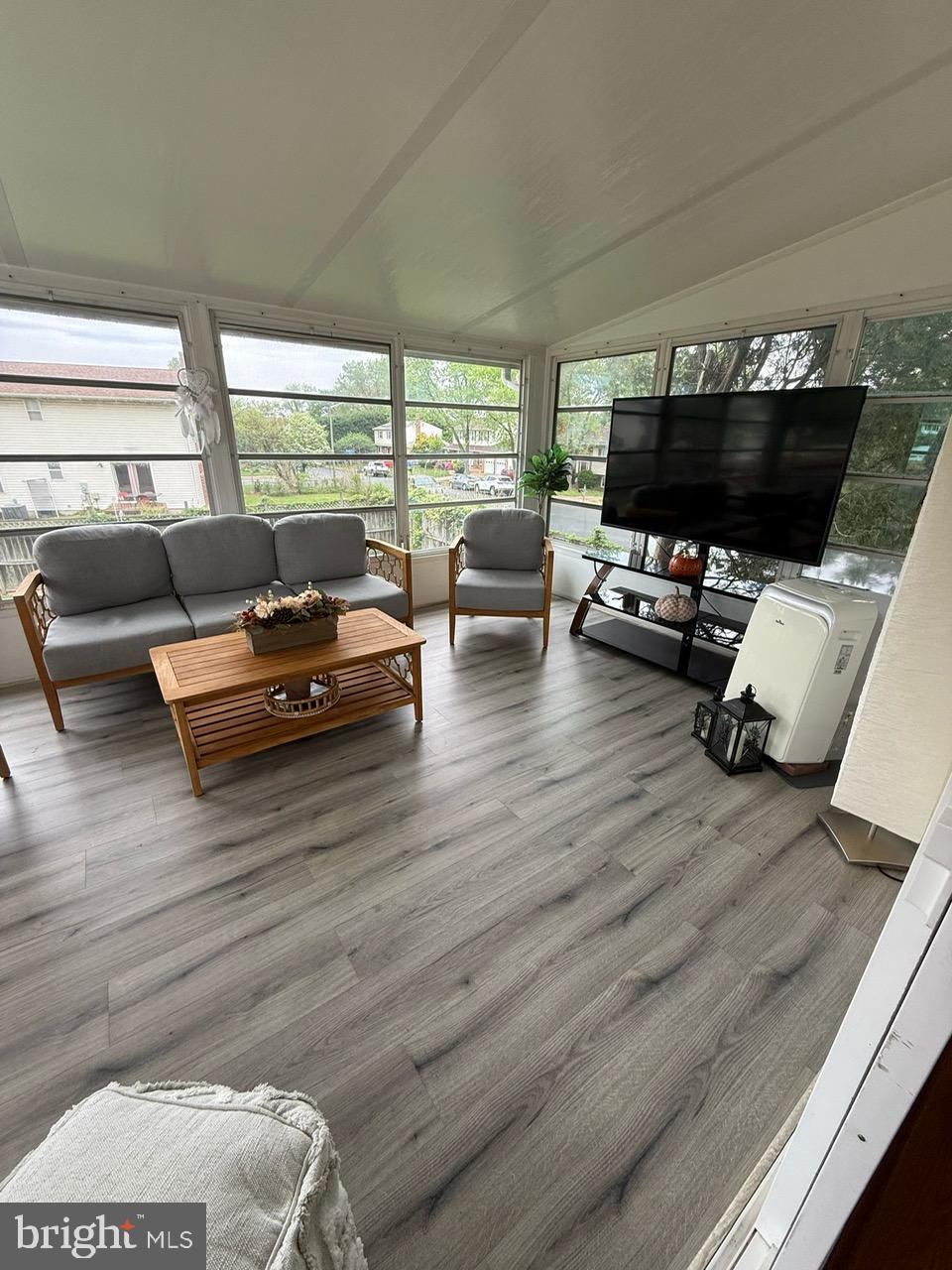 4082 Braxton Road Chantilly, VA 20151 - Photo 16 of 40 a living room with furniture and a flat screen tv