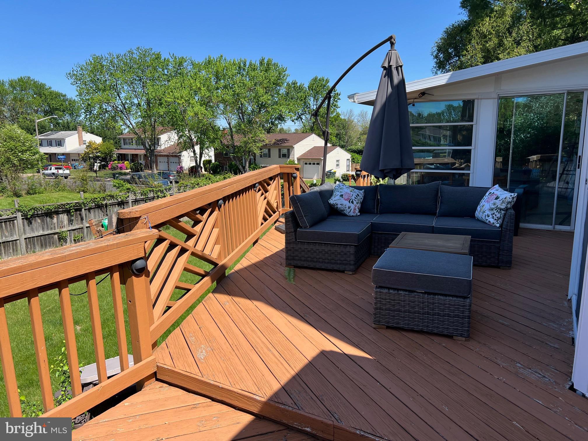 4082 Braxton Road Chantilly, VA 20151 - Photo 39 of 40 a balcony with wooden floor and outdoor seating