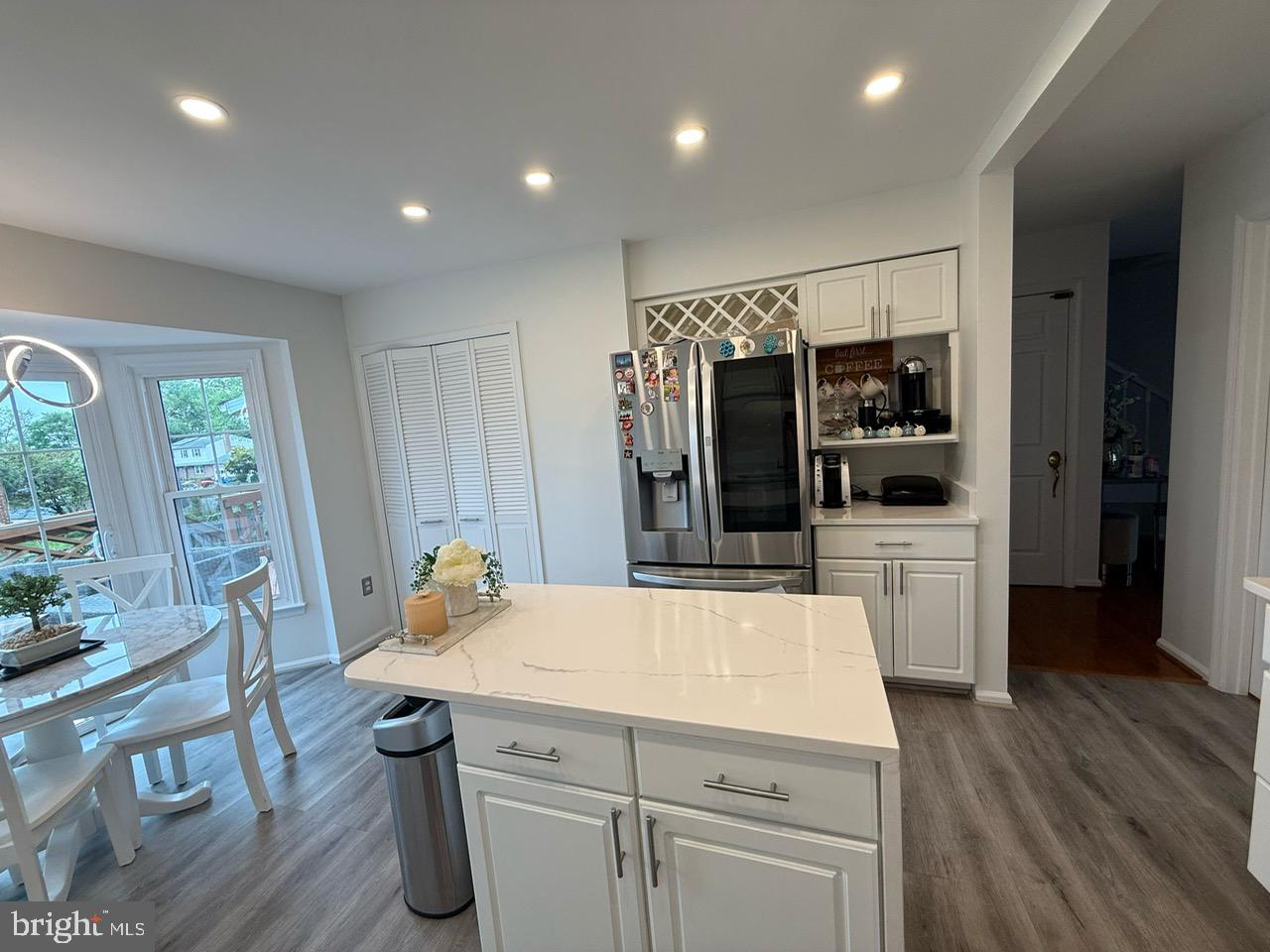 4082 Braxton Road Chantilly, VA 20151 - Photo 8 of 40 a kitchen with a refrigerator and wooden floor