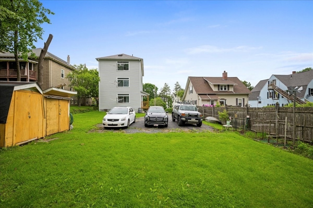 29 Tatman Street Worcester, MA 01607 - Photo 37 of 42 a view of a house with a backyard
