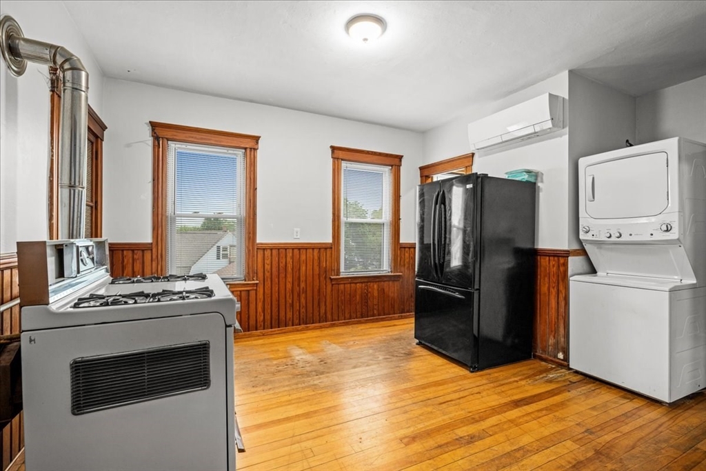 29 Tatman Street Worcester, MA 01607 - Photo 5 of 42 a kitchen with a stove microwave and refrigerator