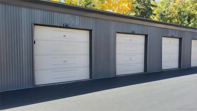 a wooden door in front of a house