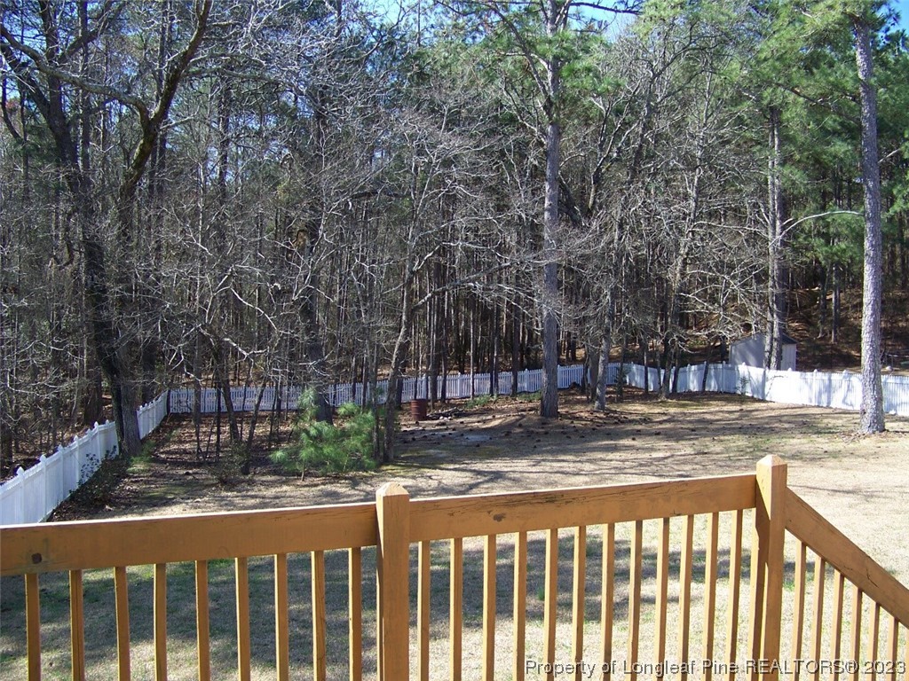 92 Cobblestone Drive Spring Lake, NC 28390 - Photo 18 of 24 a view of street with a yard
