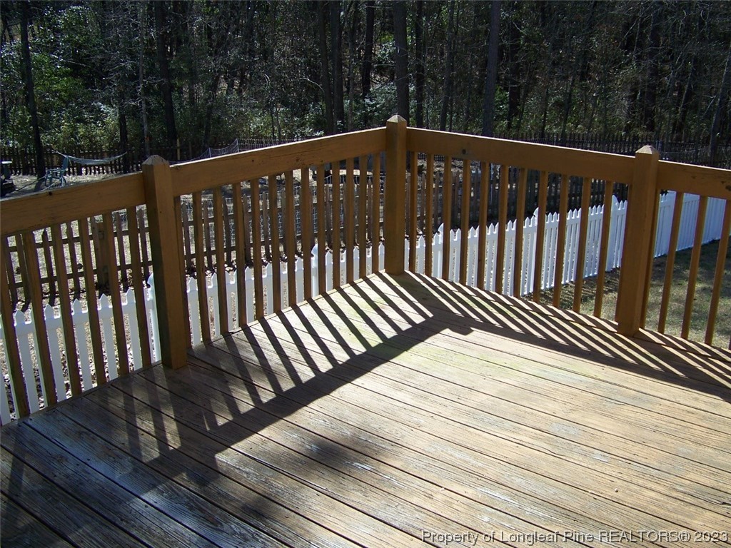 92 Cobblestone Drive Spring Lake, NC 28390 - Photo 20 of 24 a balcony with wooden floor