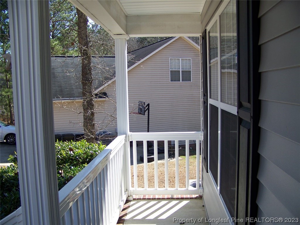 92 Cobblestone Drive Spring Lake, NC 28390 - Photo 2 of 24 a view of a house with a small yard
