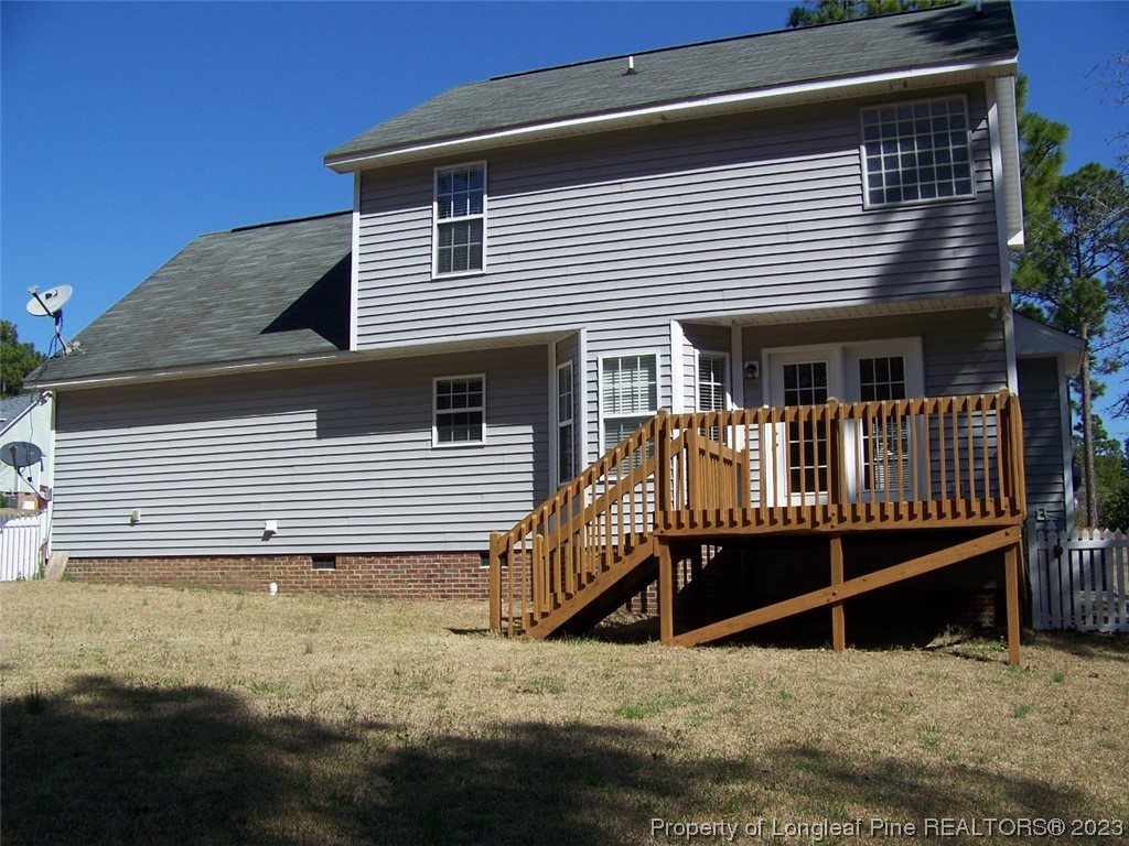 92 Cobblestone Drive Spring Lake, NC 28390 - Photo 24 of 24 a front view of a house with a yard