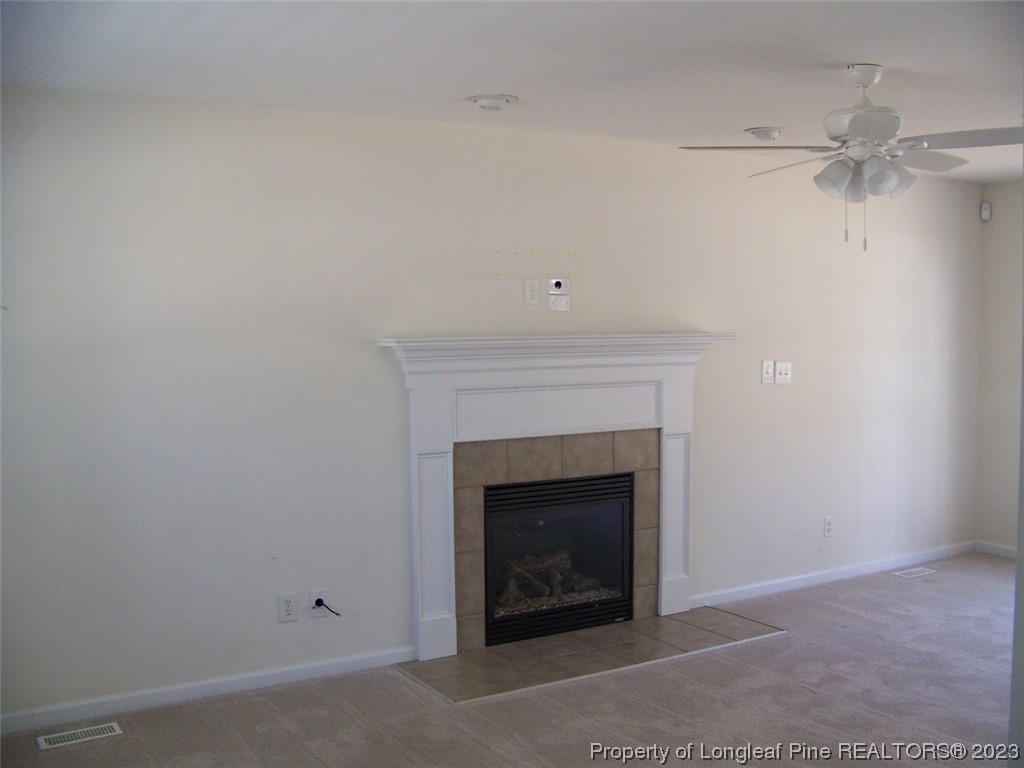 92 Cobblestone Drive Spring Lake, NC 28390 - Photo 4 of 24 a room with a fireplace
