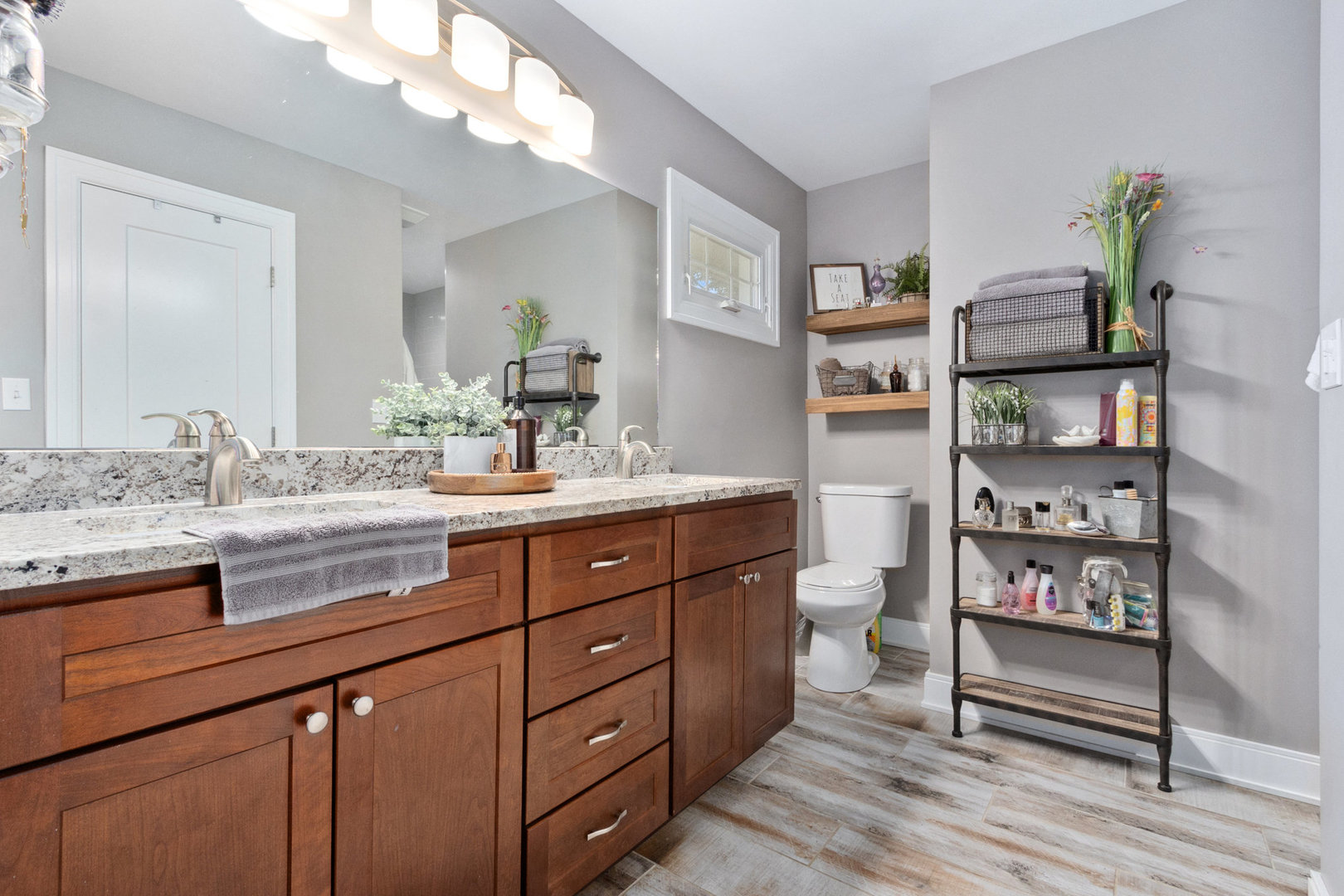 11426 South Brightway Road Mokena, IL 60448 - Photo 16 of 39 a bathroom with a sink a vanity and a toilet