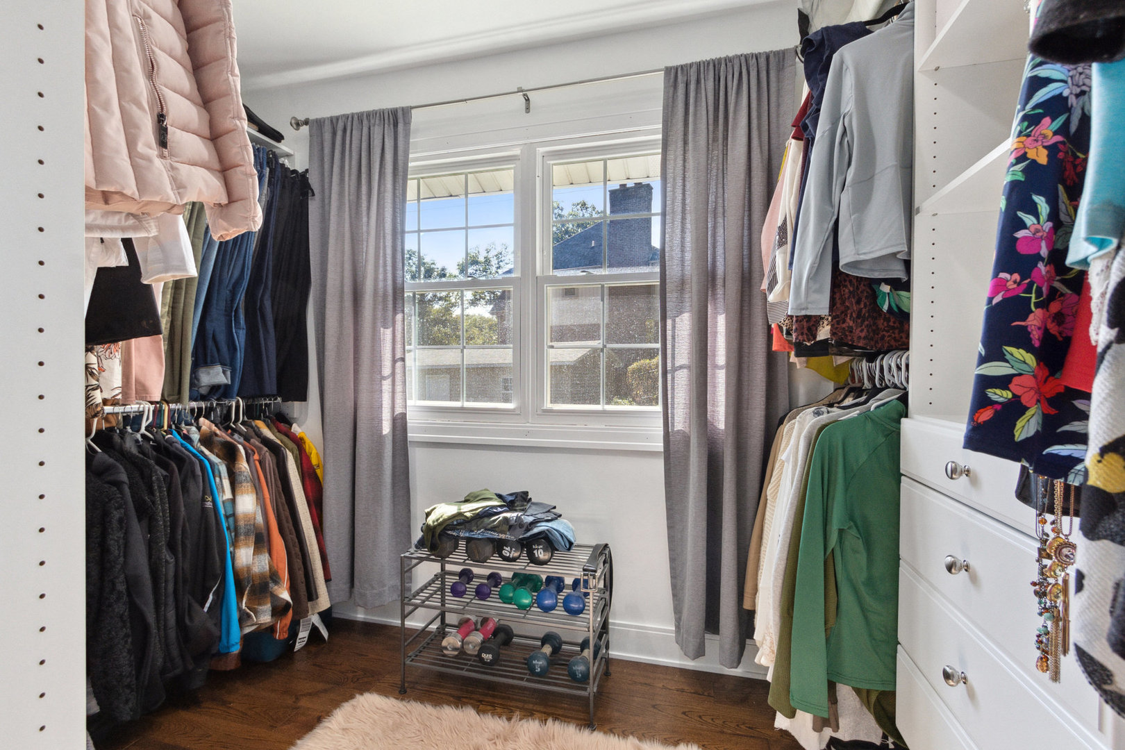 11426 South Brightway Road Mokena, IL 60448 - Photo 18 of 39 a view of walk in closet with clothes and shoes