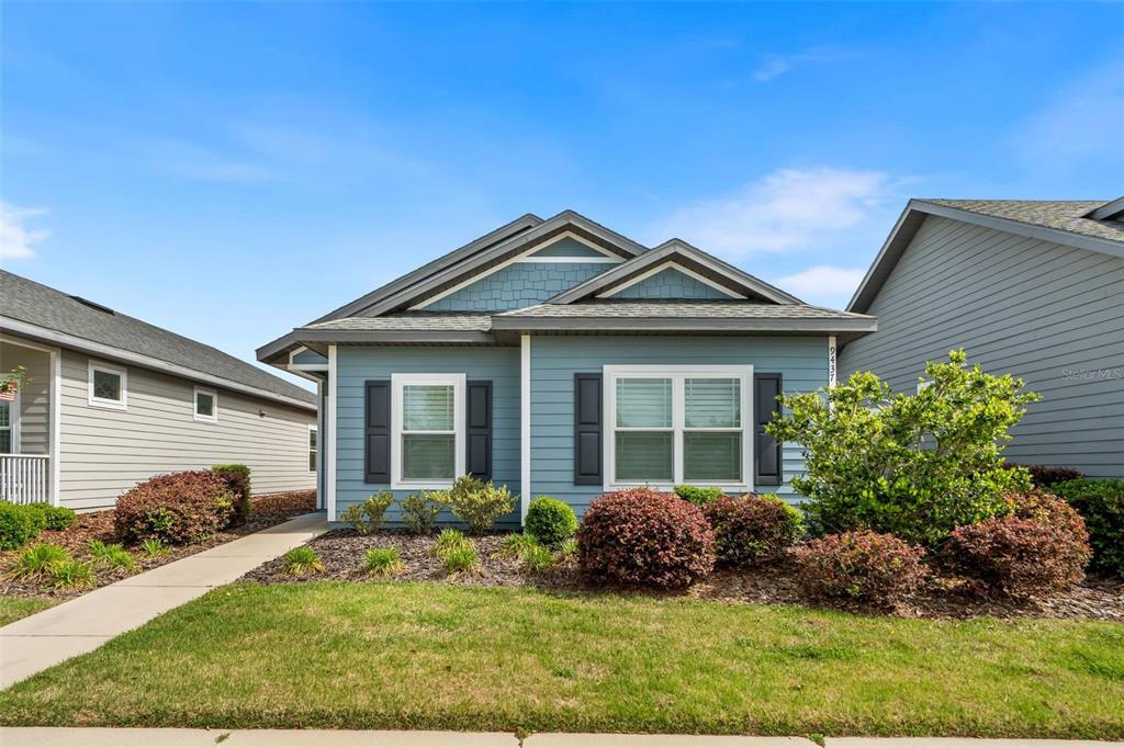a view of a house with a garden