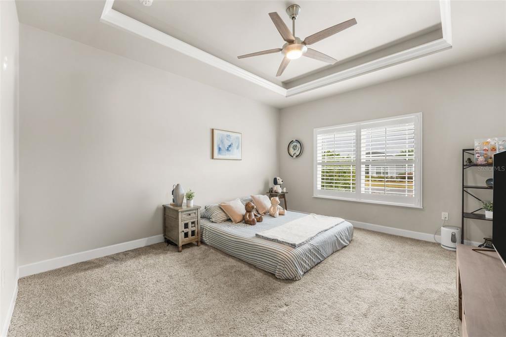 9437 Southwest 67th Lane Gainesville, FL 32608 - Photo 12 of 41 a living room with furniture and a window