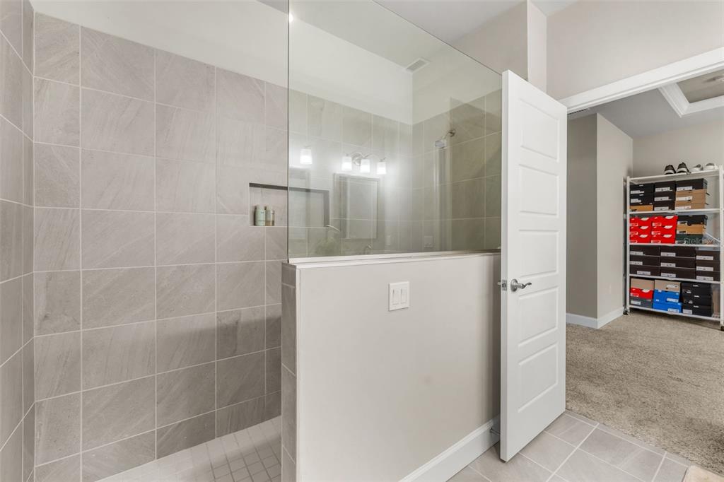 9437 Southwest 67th Lane Gainesville, FL 32608 - Photo 15 of 41 a view of a hallway with storage and utility