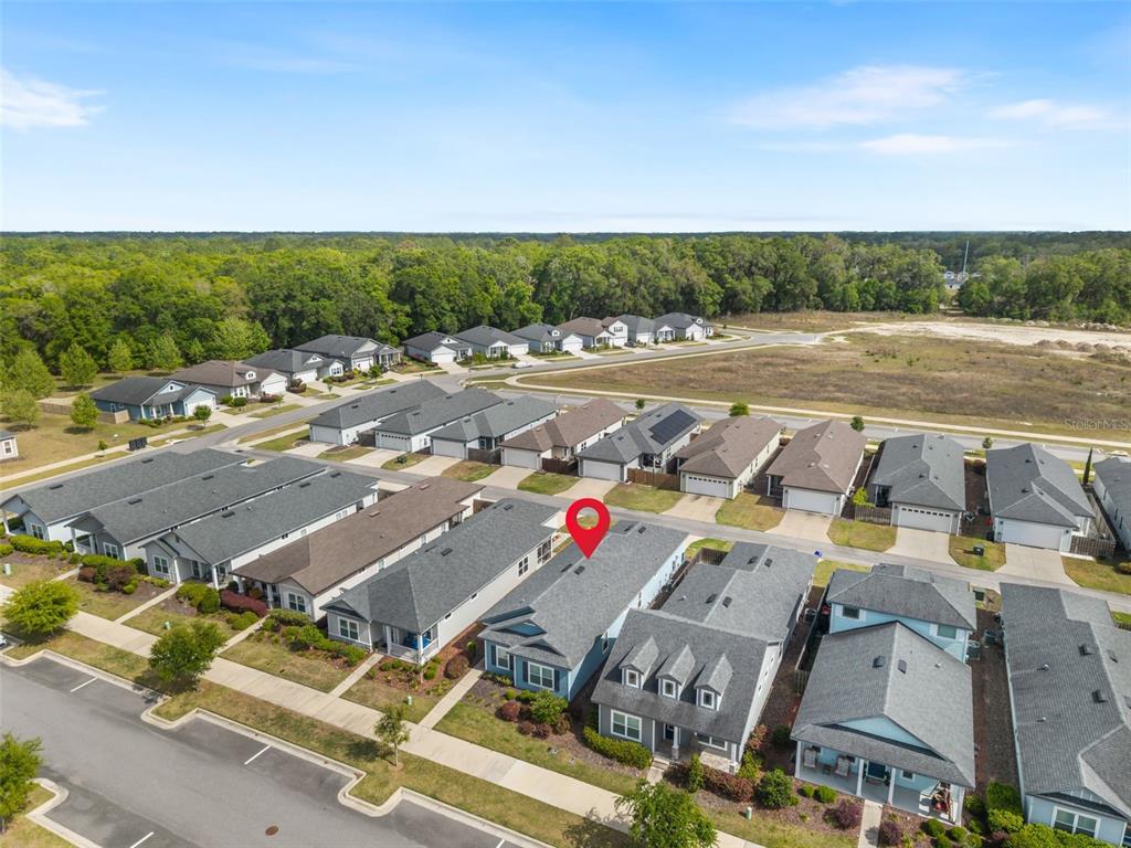 9437 Southwest 67th Lane Gainesville, FL 32608 - Photo 2 of 41 an aerial view of residential house with beach