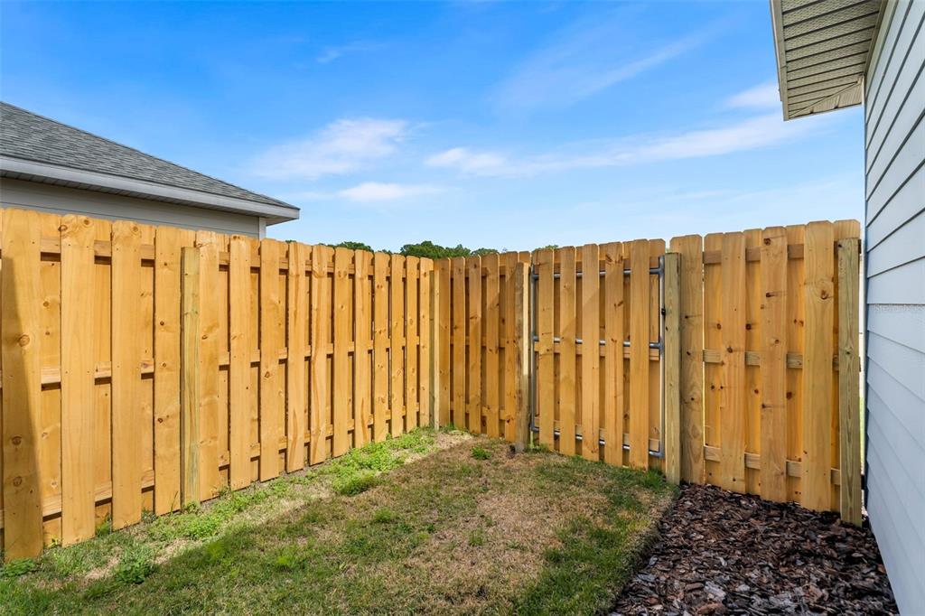 9437 Southwest 67th Lane Gainesville, FL 32608 - Photo 22 of 41 a view of a backyard