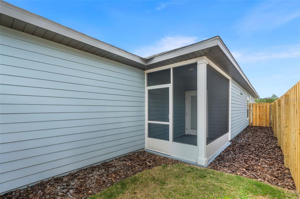 9437 Southwest 67th Lane Gainesville, FL 32608 - Photo 23 of 41 a view of a house with a porch