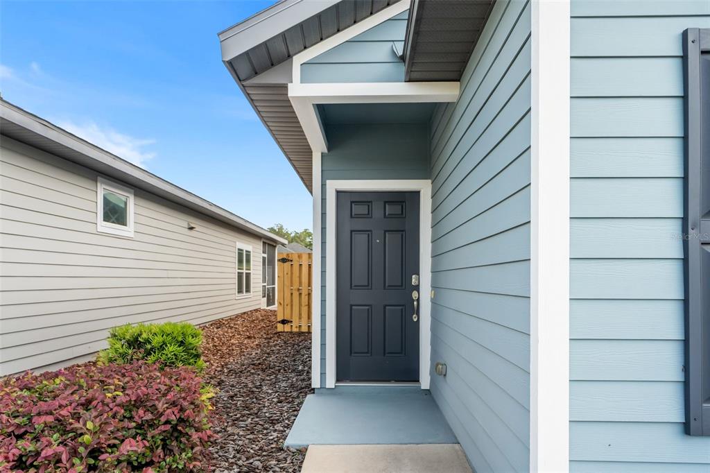 9437 Southwest 67th Lane Gainesville, FL 32608 - Photo 24 of 41 a view of front door
