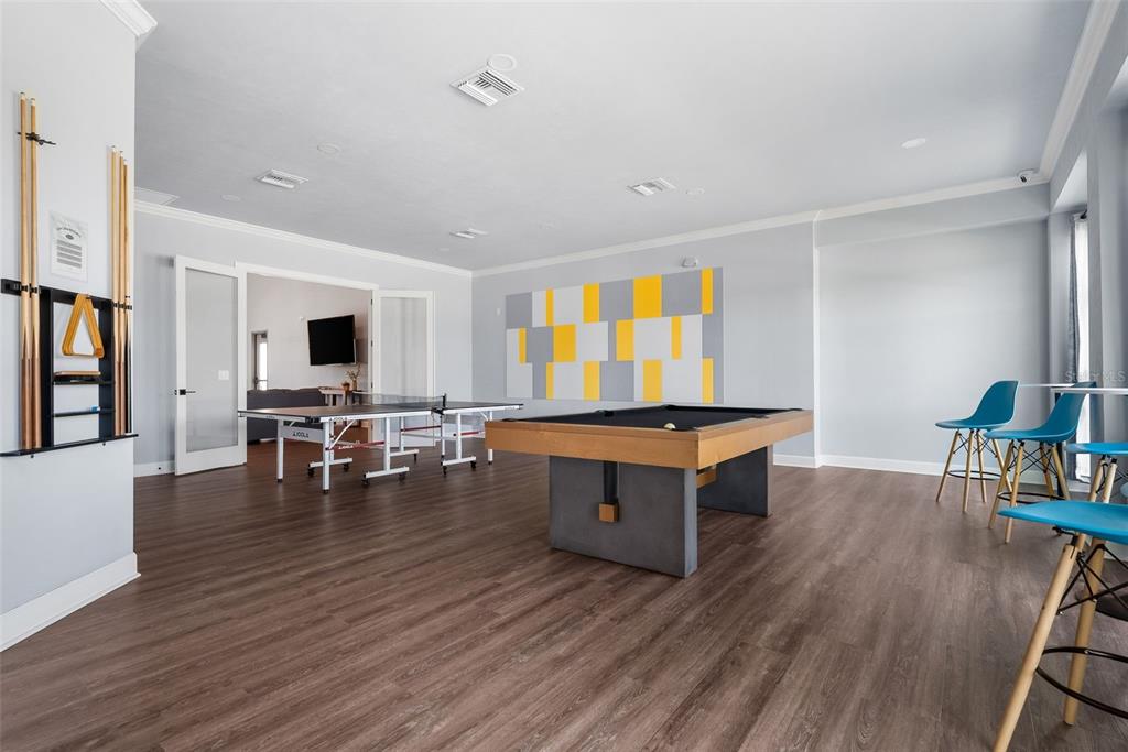 9437 Southwest 67th Lane Gainesville, FL 32608 - Photo 40 of 41 a living room with furniture and wooden floor