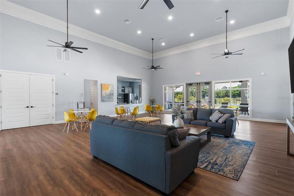 9437 Southwest 67th Lane Gainesville, FL 32608 - Photo 41 of 41 a living room with furniture and a wooden floor
