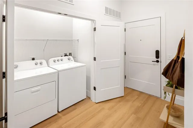 a view of utility room with washer and dryer
