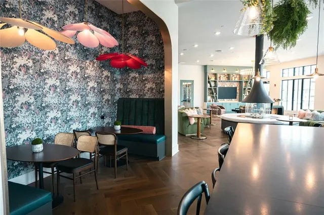 a view of a swimming pool with chairs