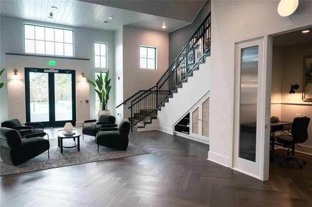 a kitchen with a table and chairs in it
