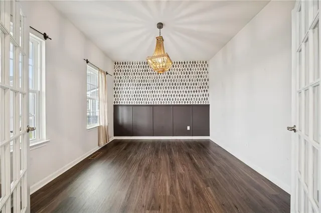a view of entryway with wooden floor