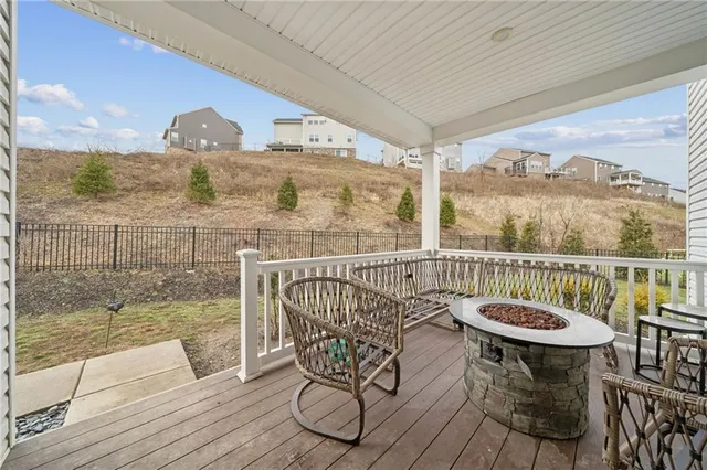 a view of a balcony with furniture
