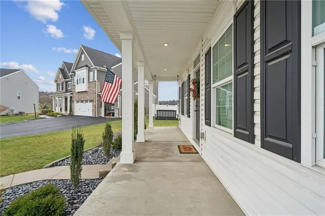 a front view of a house with a porch