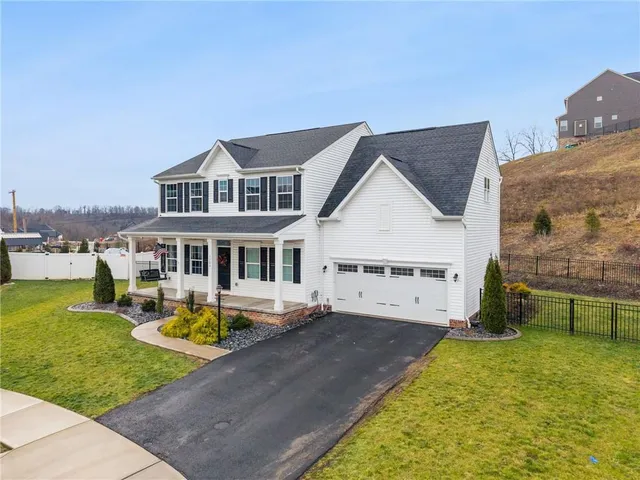 a view of a house with a swimming pool