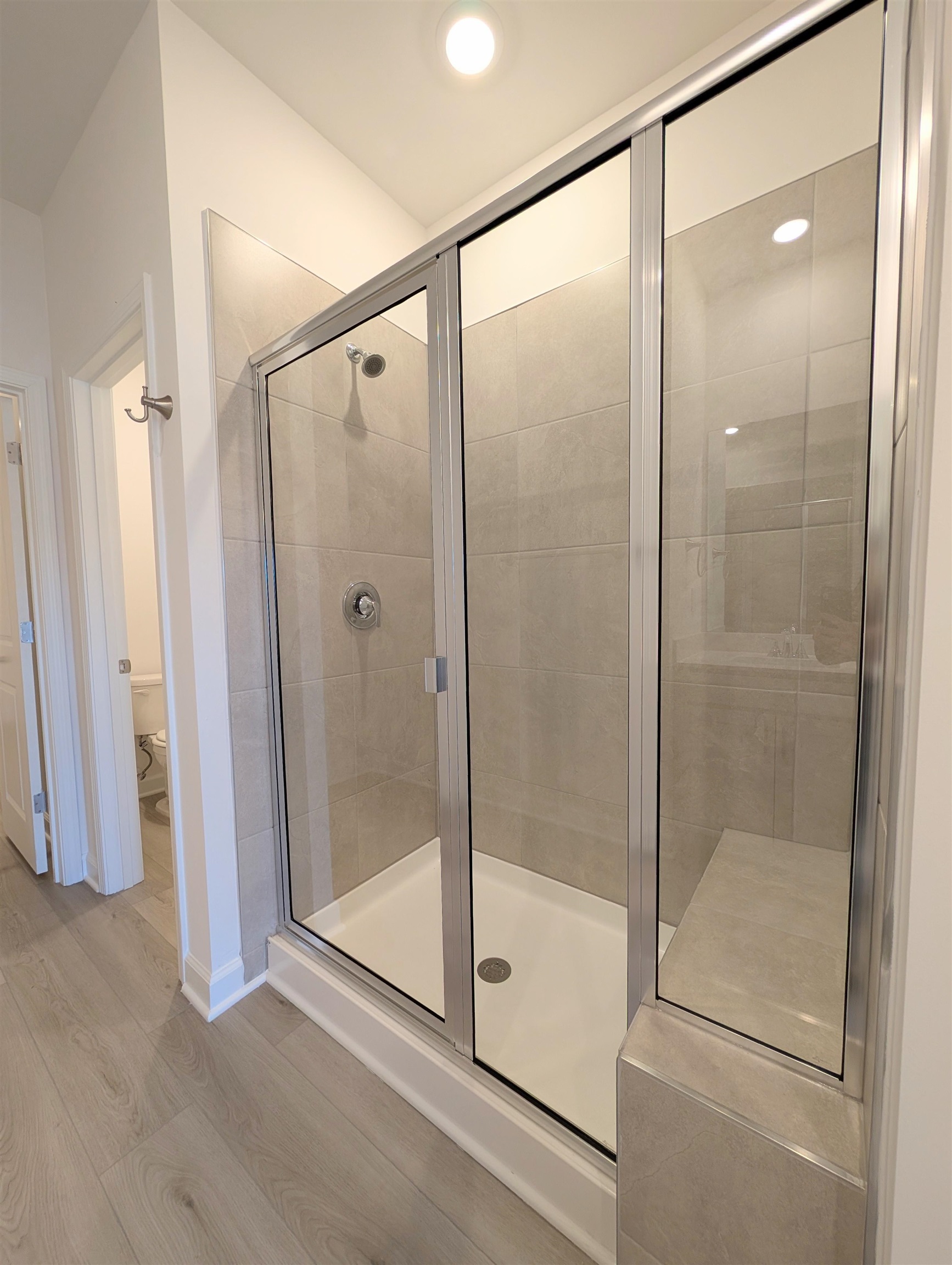 1508 Regal Fern Way Longs, SC 29568 - Photo 18 of 38 Full bath featuring a stall shower and wood finished floors