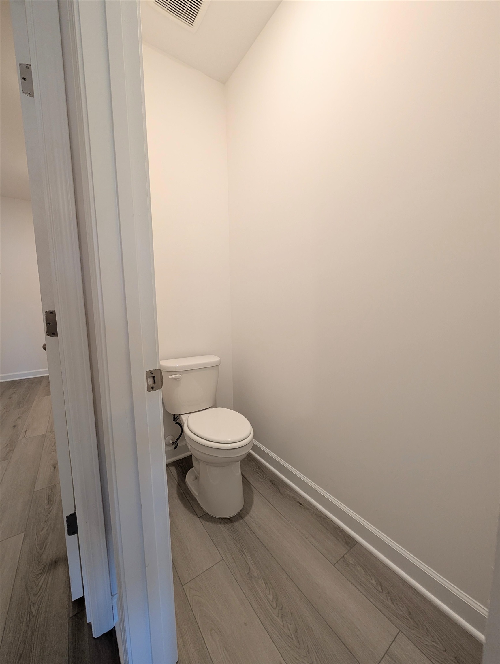 1508 Regal Fern Way Longs, SC 29568 - Photo 19 of 38 Bathroom with light wood-style floors and baseboards