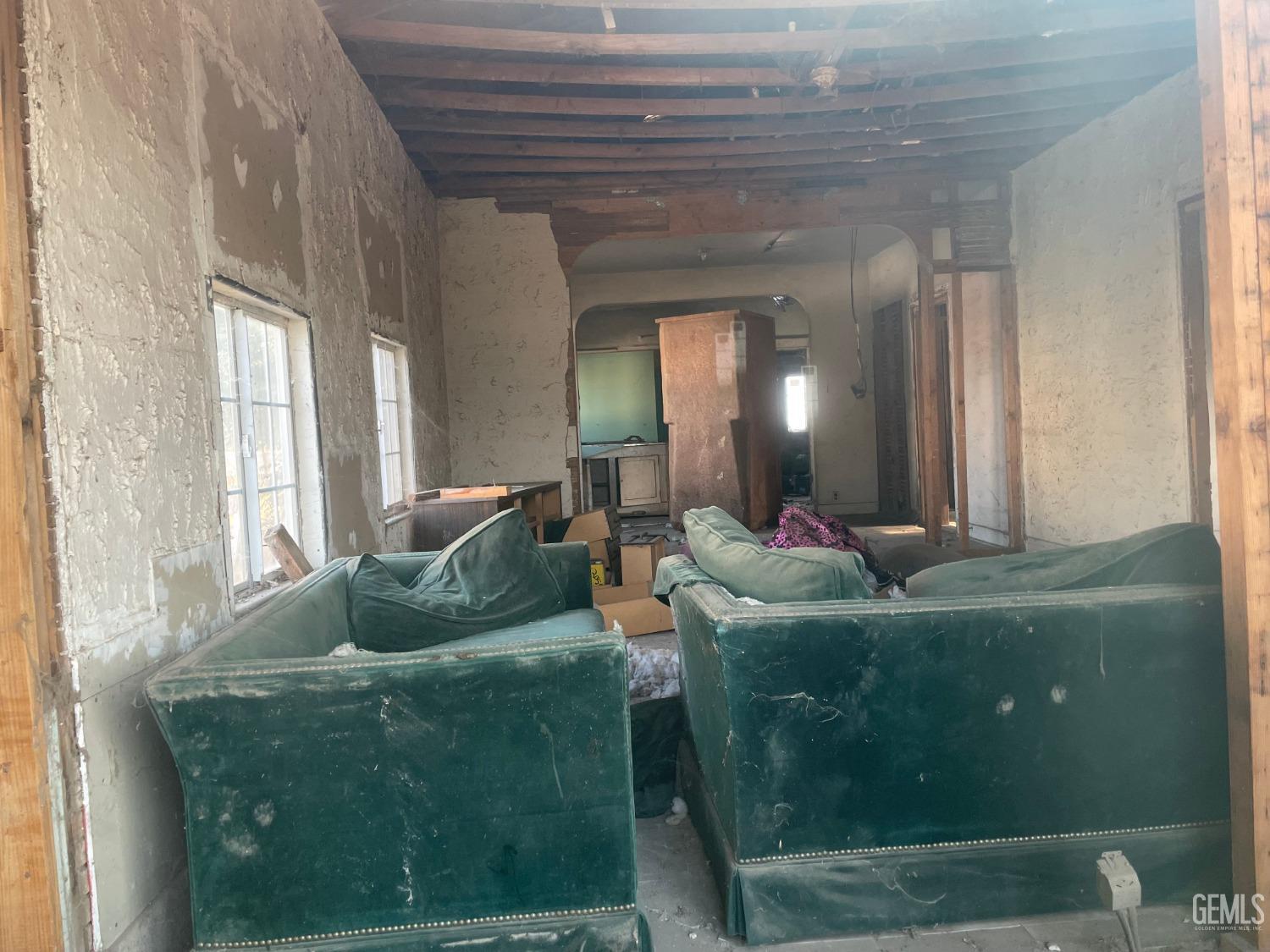 Undisclosed Address Buttonwillow, CA 93206 - Photo 4 of 7 a living room with furniture and a large window